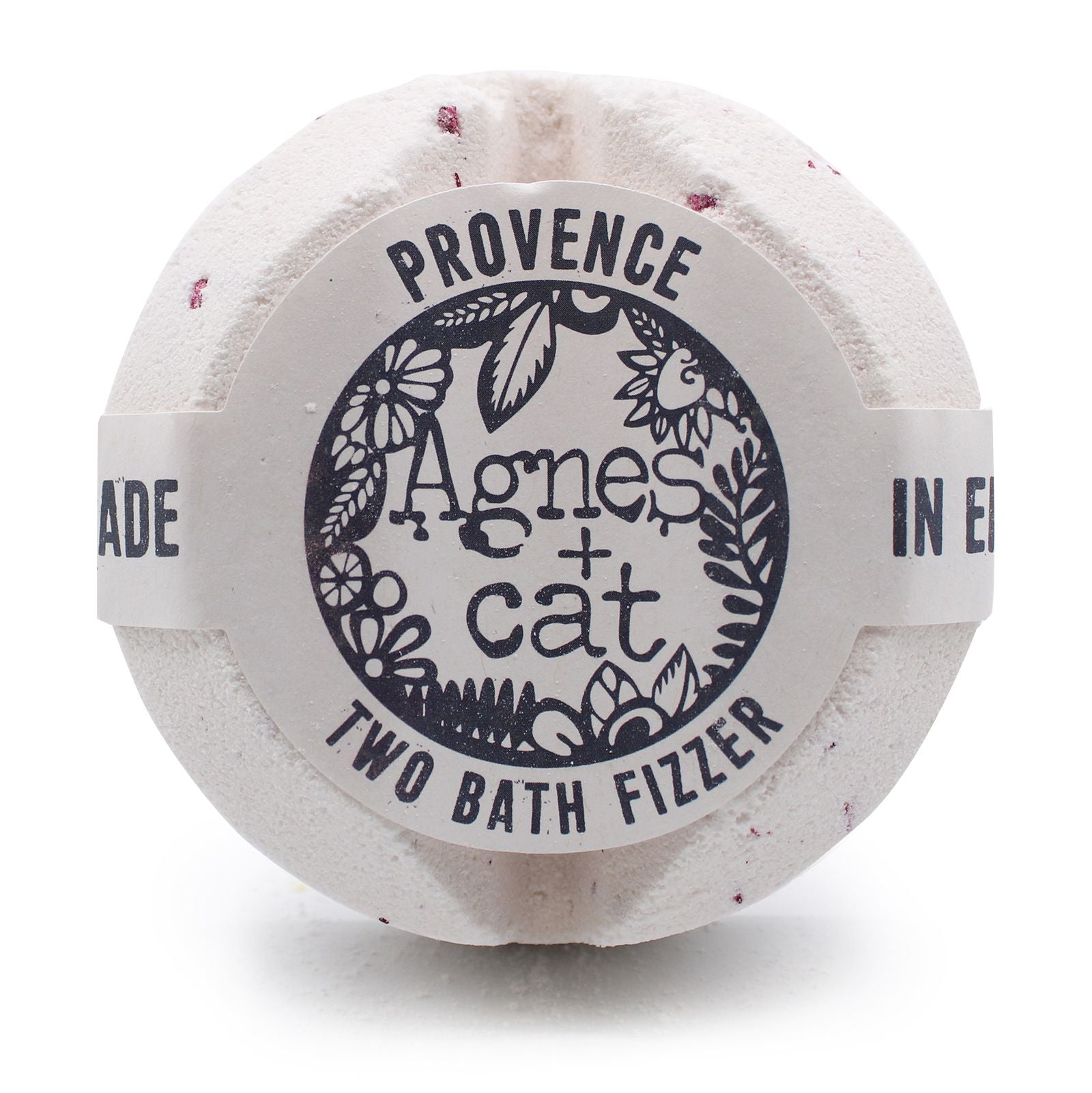 A large white bath fizzer wrapped in plastic with a grey and black label inspired by Provencal lavender.
