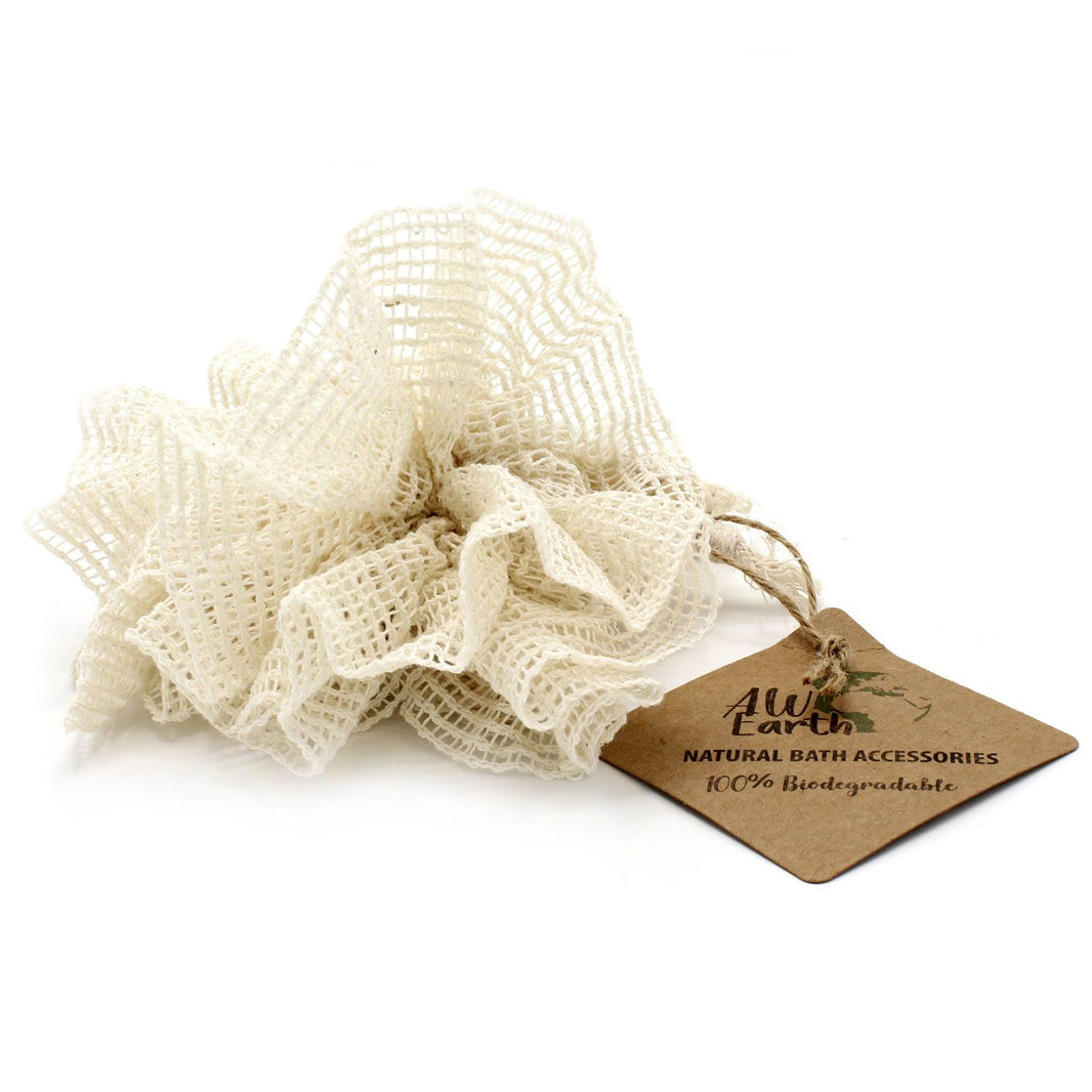 A natural, cream-colored bath scrunchie made from eco-friendly ramie plant fibers with a brown hanging tag.