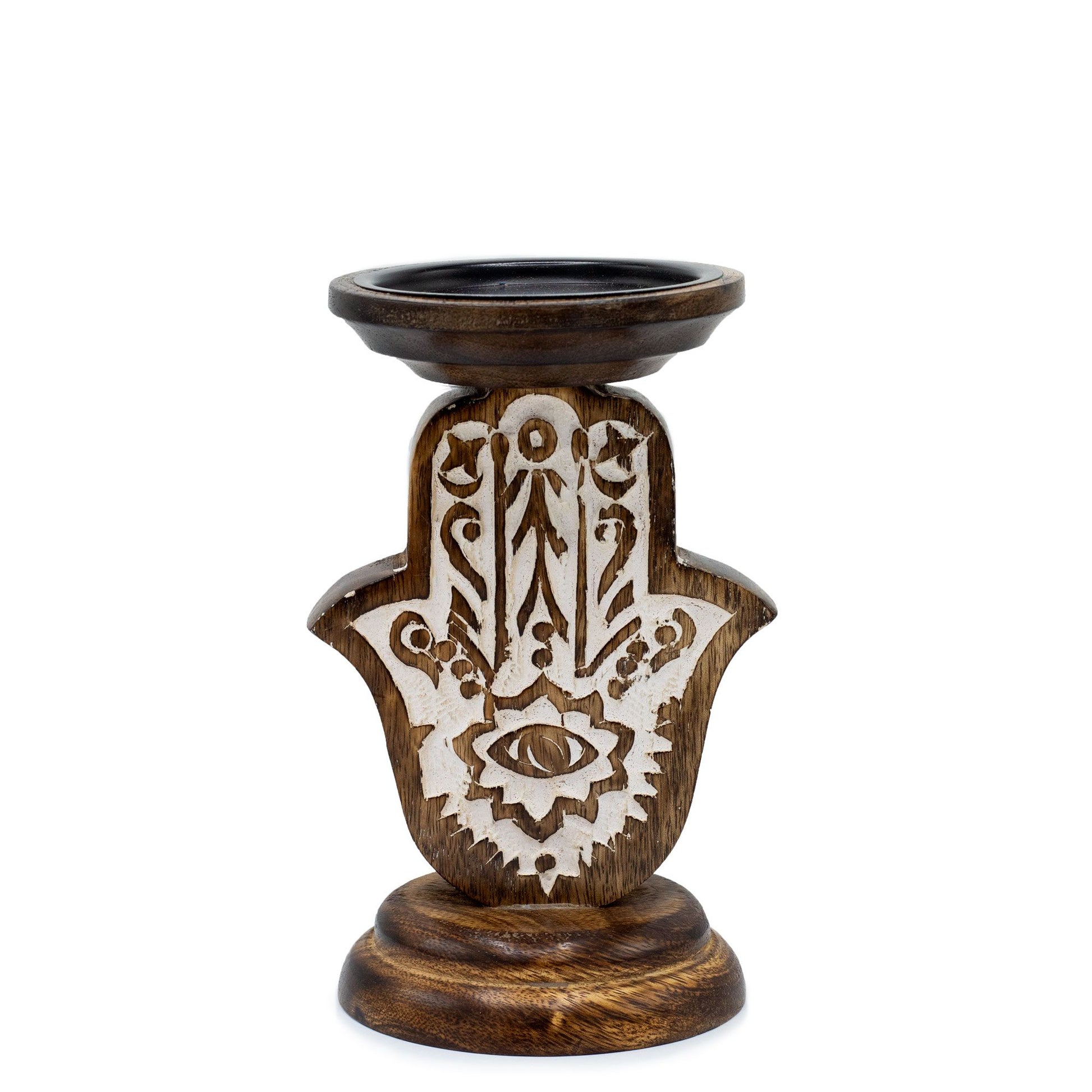 Hand-carved dark mango wood ritual candle tray in the shape of a Hamsa hand for spiritual home decor and altars.
