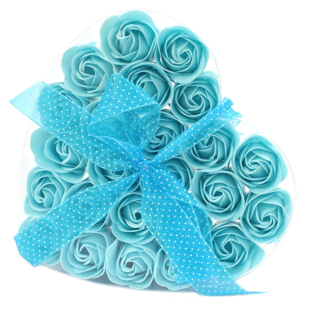 A large heart-shaped box packed with twenty-four realistic blue soap roses, ideal for unique celebrations or "something blue" gifts.