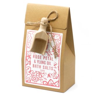 A 500g kraft paper bag of pink Himalayan bath salts infused with botanical rose petals and ylang ylang oils.
