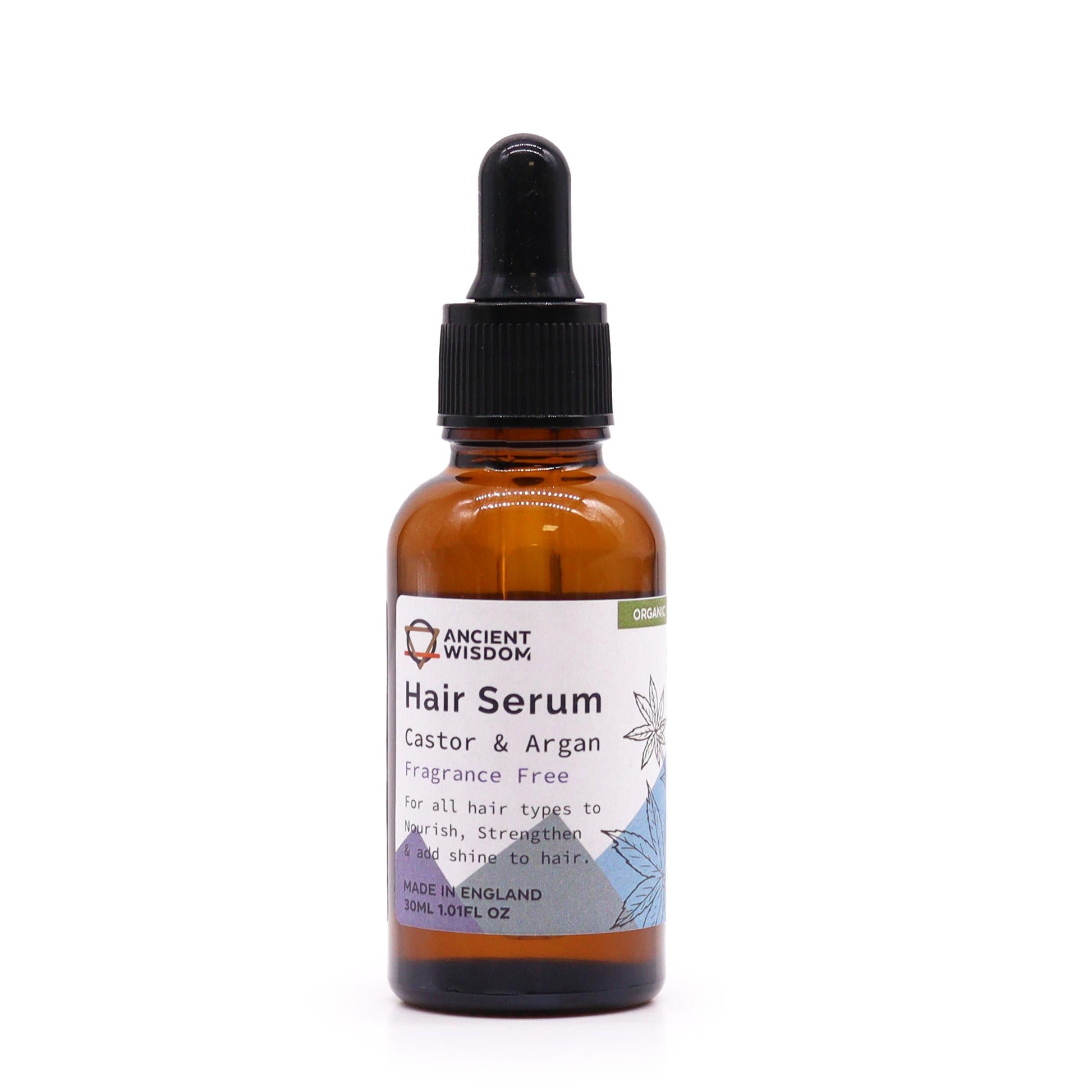 A 30ml amber glass bottle of organic, fragrance-free hair serum with a professional black dropper.