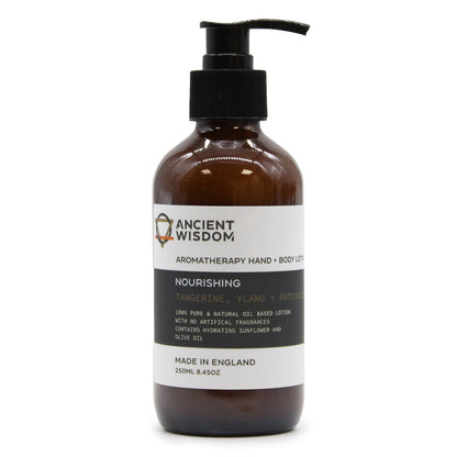 A 250ml amber pump bottle of hand and body lotion featuring a luxury apothecary label and essential oil blend.