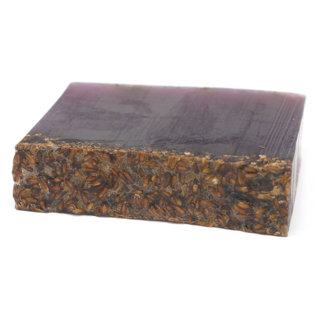 A 100g purple marbled artisan soap slice featuring a calming lavender fragrance for relaxation.
