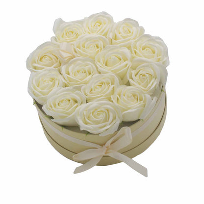 A large round white gift box packed with 14 realistic cream soap roses, perfect for neutral home decor or gifting.