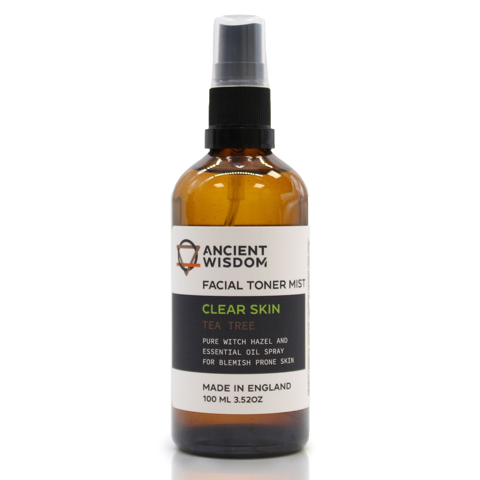 A 100ml amber spray bottle of Witch Hazel and Tea Tree toner with a white and gold apothecary-style label.