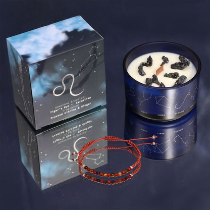A decorative Leo-themed candle jar in dark packaging with a surprise jewelry bracelet reveal.