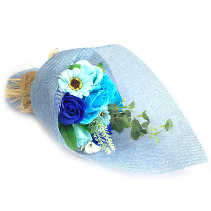 A standing bouquet of blue and white soap roses wrapped in decorative blue paper, ideal for a "something blue" or celebration gift.