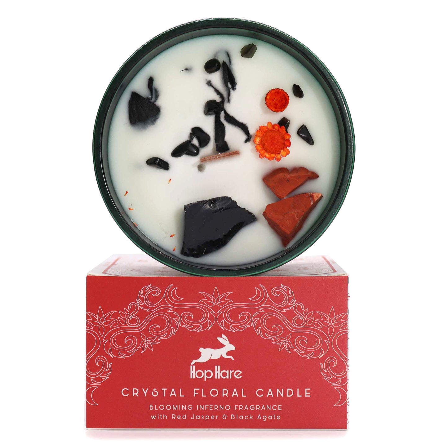 The Devil ritual candle from Hop Hare with dark botanical accents and raw gemstones for shadow work and energy.