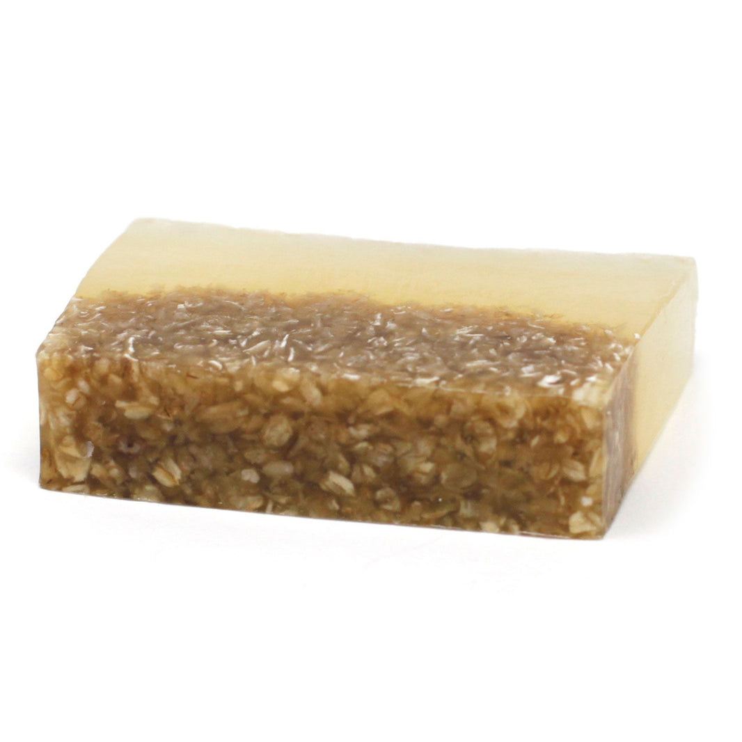 A 100g artisan soap slice featuring golden honey tones and visible natural oat inclusions for skin soothing.