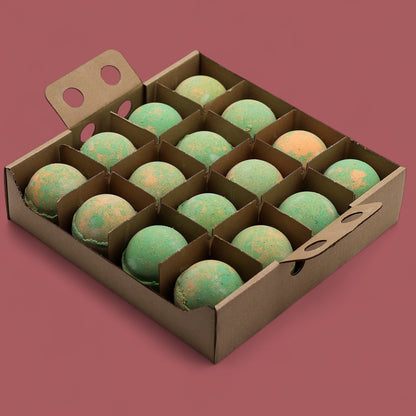 A cardboard display box holding sixteen individually wrapped 180g orange and green marbled Hawaiian Mango bath bombs.