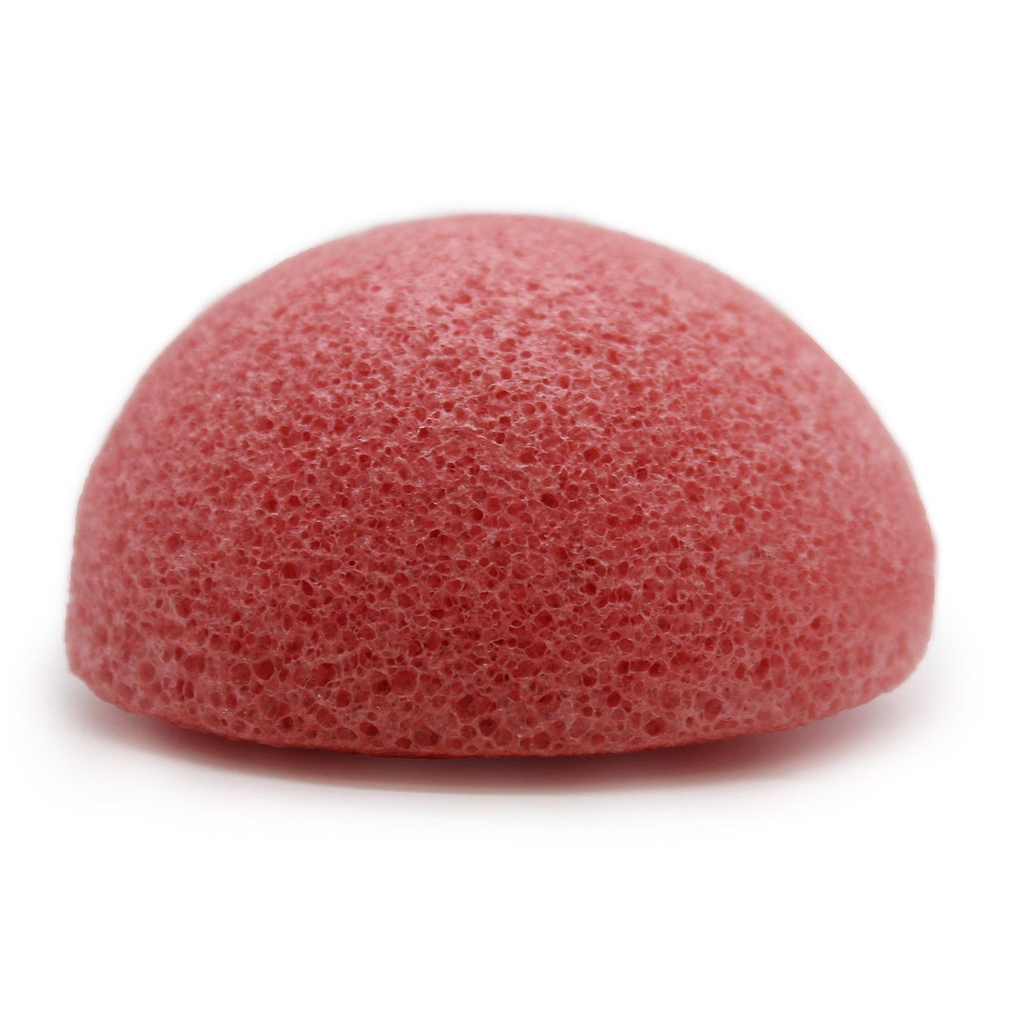 A soft pink, round natural Konjac facial sponge infused with rose extract for gentle skincare.