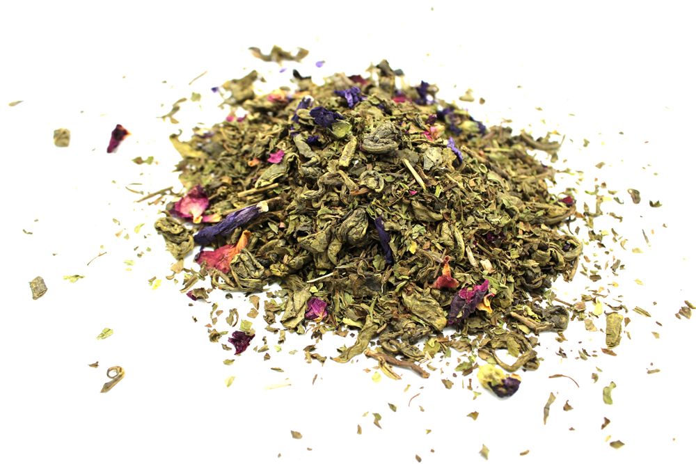 A large 1kg quantity of loose leaf herbal tea showing vibrant dried flower petals and green leaves.