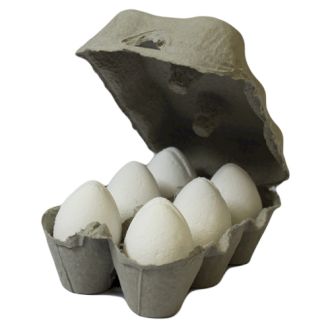 Six white egg-shaped bath bombs nestled securely inside a realistic grey cardboard egg carton.