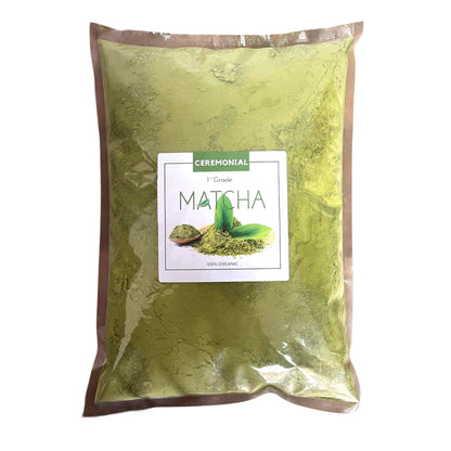 A premium green foil pouch of first-grade ceremonial organic matcha powder with a professional white and green label.