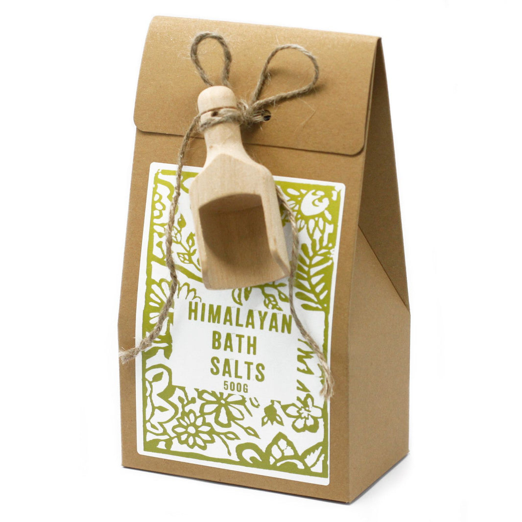 A 500g eco-friendly bag filled with coarse, natural pink Himalayan salt crystals for therapeutic bathing.