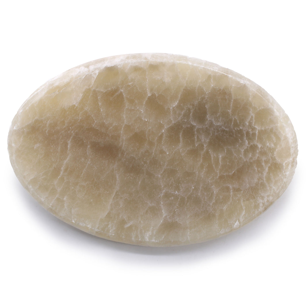 A polished, smooth oval soap dish crafted from natural onyx stone with creamy, translucent earthy patterns.