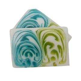 A 115g handcrafted soap slice with green and white swirls, infused with soothing aloe vera extracts.