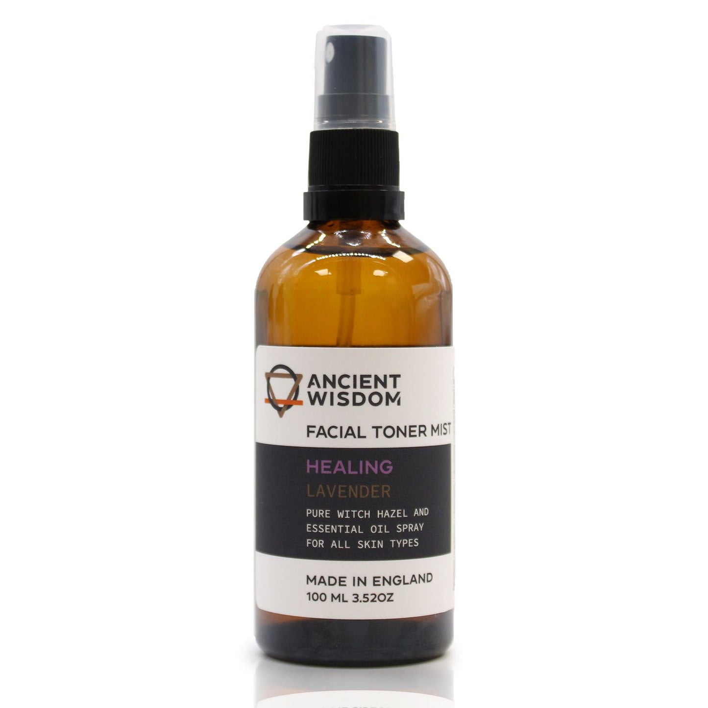 A 100ml amber spray bottle of Witch Hazel and Lavender facial toner with a white and gold apothecary-style label.