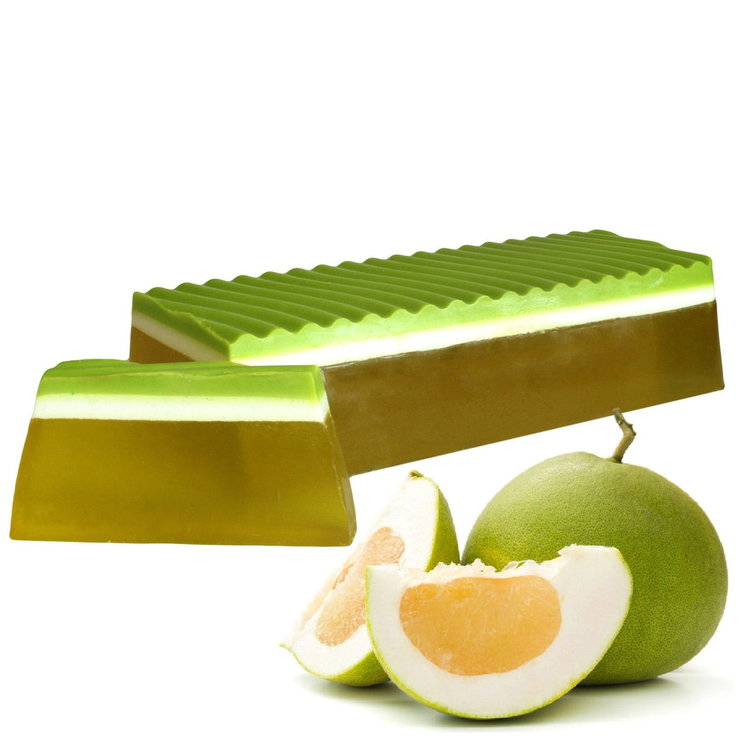 A large 1.1kg handcrafted soap loaf with green and white artisan layers, scented with fresh tropical pomelo.