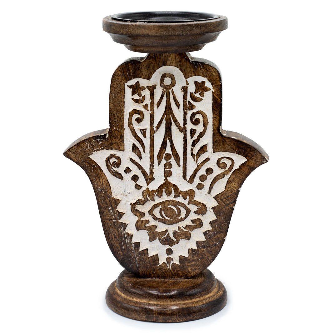 Large decorative mango wood candle holder carved with a Hamsa hand design, ideal for holding healing crystal candles.