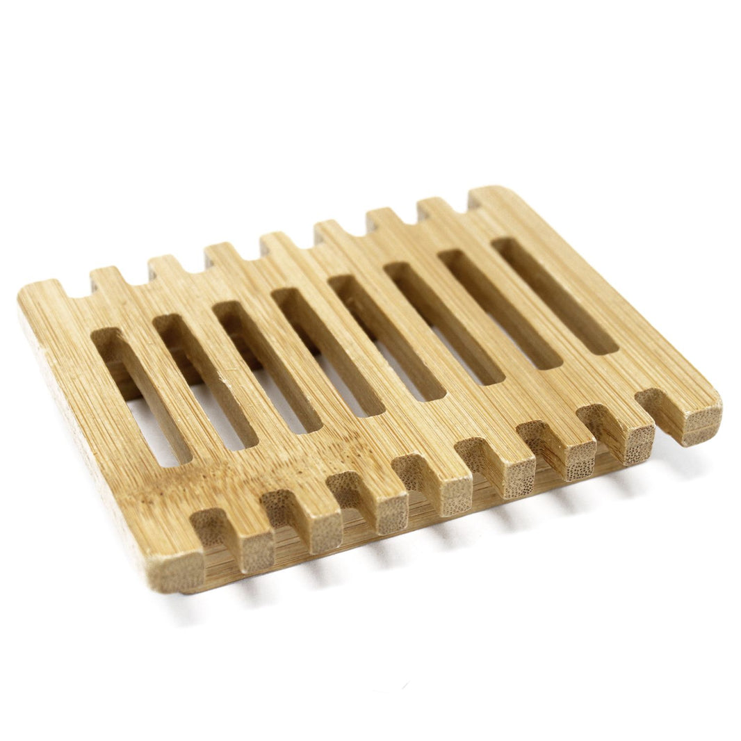 A unique Hemu wood soap dish with a "piano key" slat design for efficient and stylish soap drying.