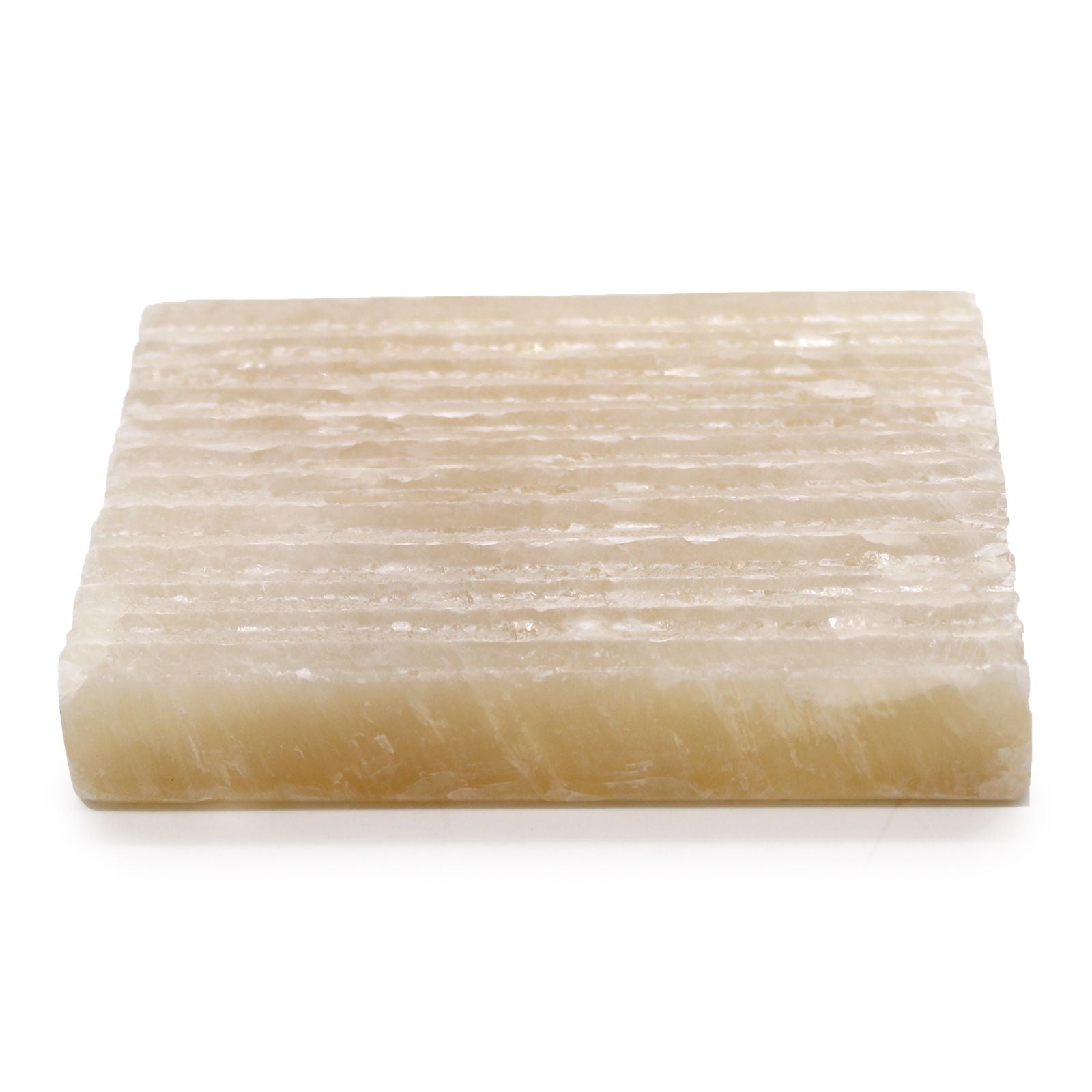 A square, hand-carved soap dish made from polished natural honey onyx featuring elegant golden and cream stone veining.