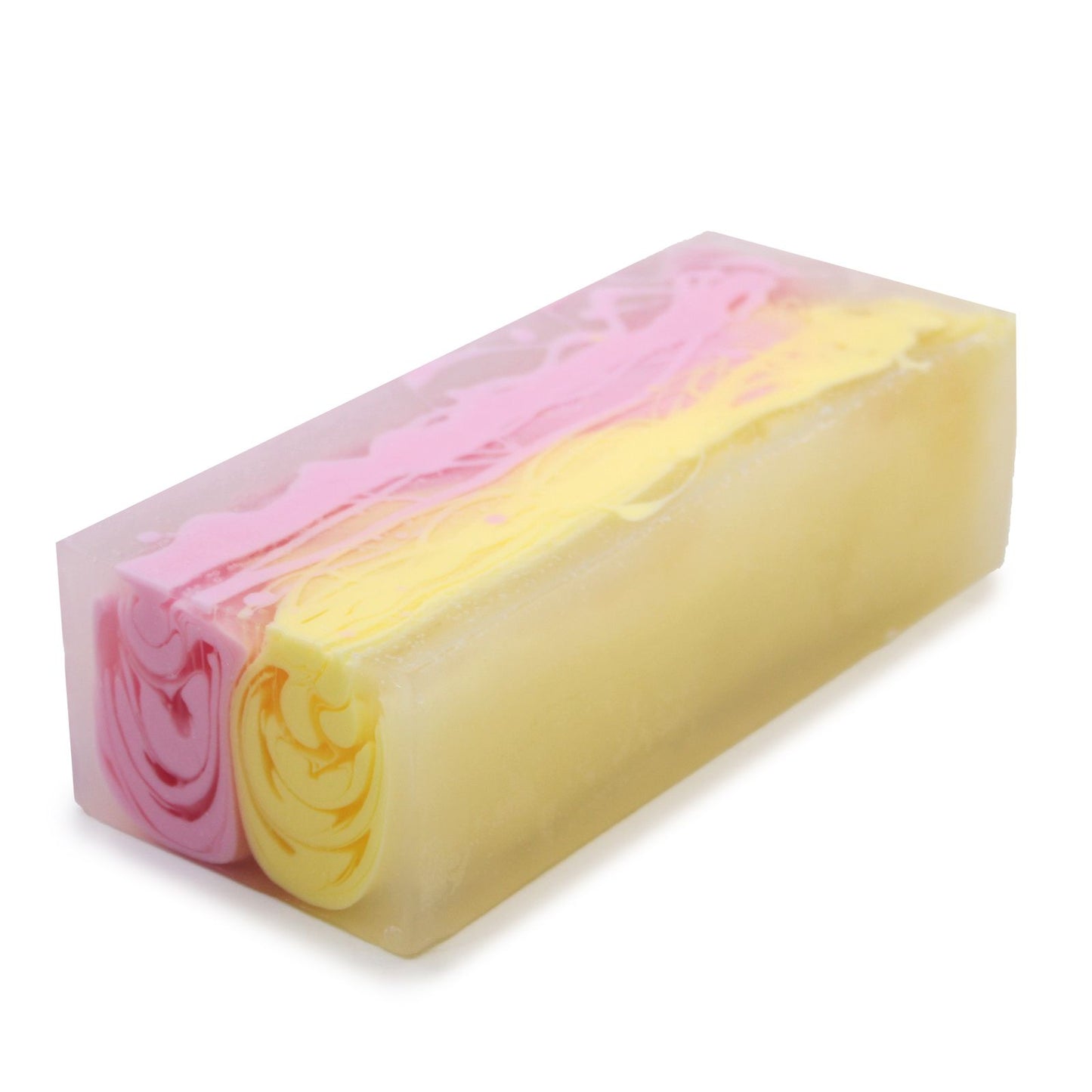 A large 1.2kg artisan soap loaf with pink and cream layers and a fragrant, floral magnolia scent.